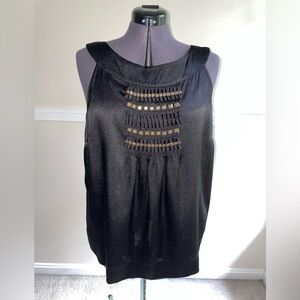 Michael Kors satin-like top with sewn embellishments on the front.
